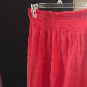 2 short summery skirts. Never worn. Size XS